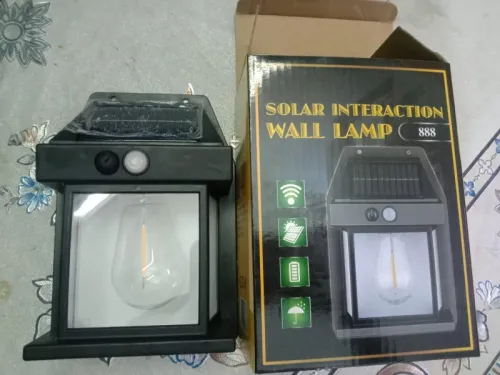 LED Solar Wall Lamp Outdoor Waterproof Up And Down Luminous Lighting Garden photo review